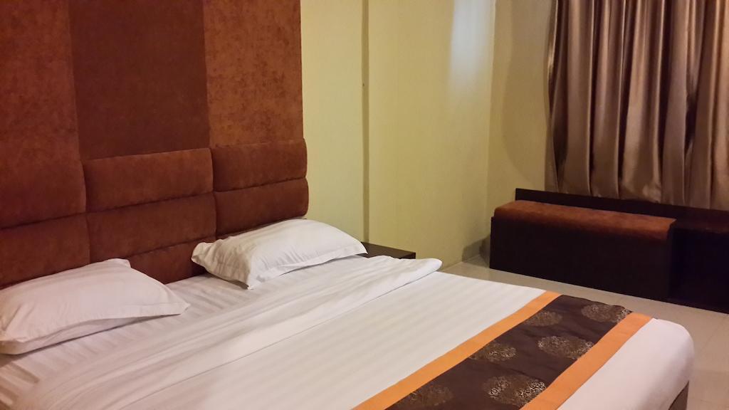 Nagoya One Hotel Batam Quarto foto